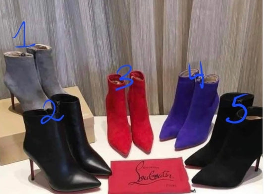 CL red bottom boot heels