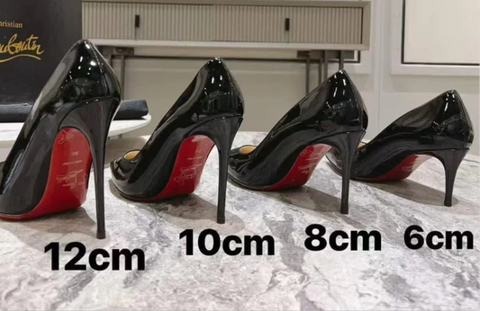 CL red bottom closed toe heels